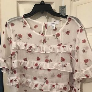 Sheer ruffle top in white with red floral print